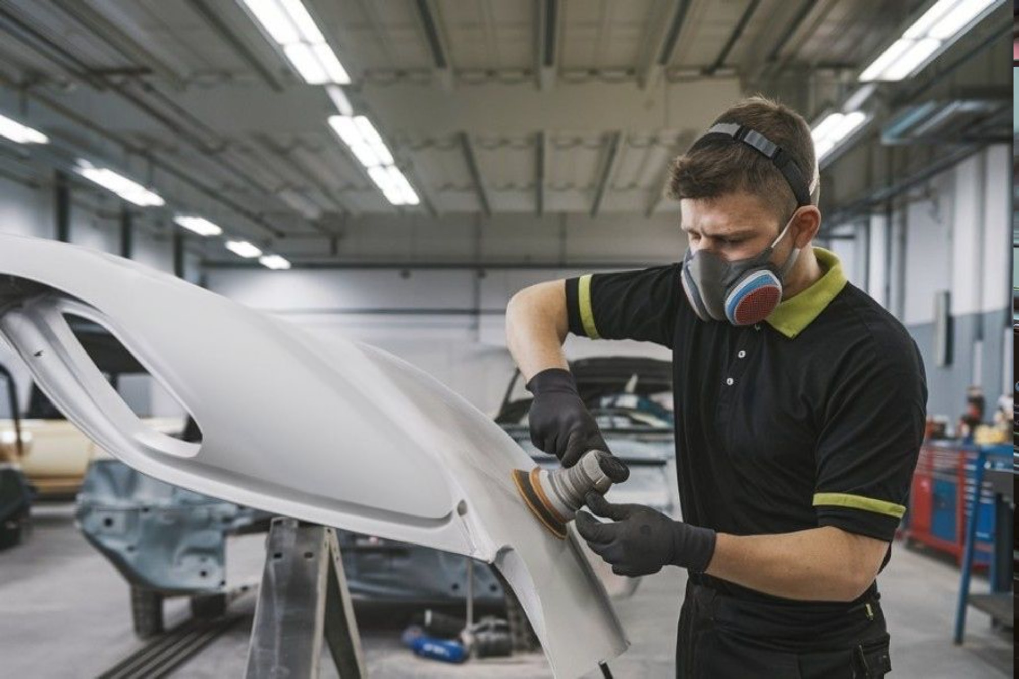 Auto Paint Repair tech sanding